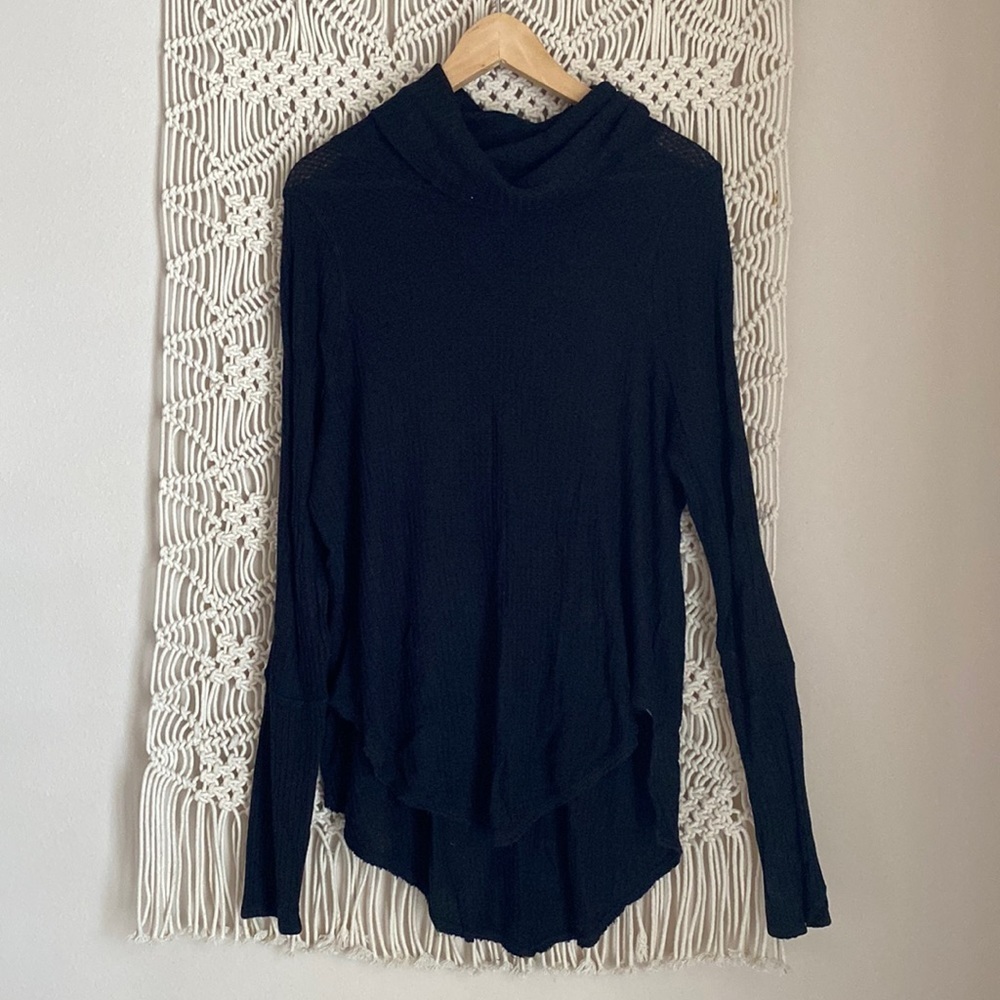 Free People,oversized black turtleneck,size medium. Oversized, distressed